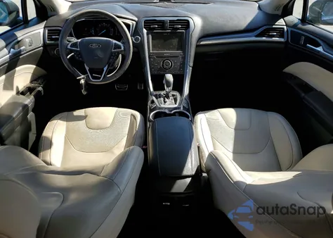 2015 Ford Fusion Titanium Phev z USA, uszkodzony, nr VIN 3FA6P0SU3FR251356